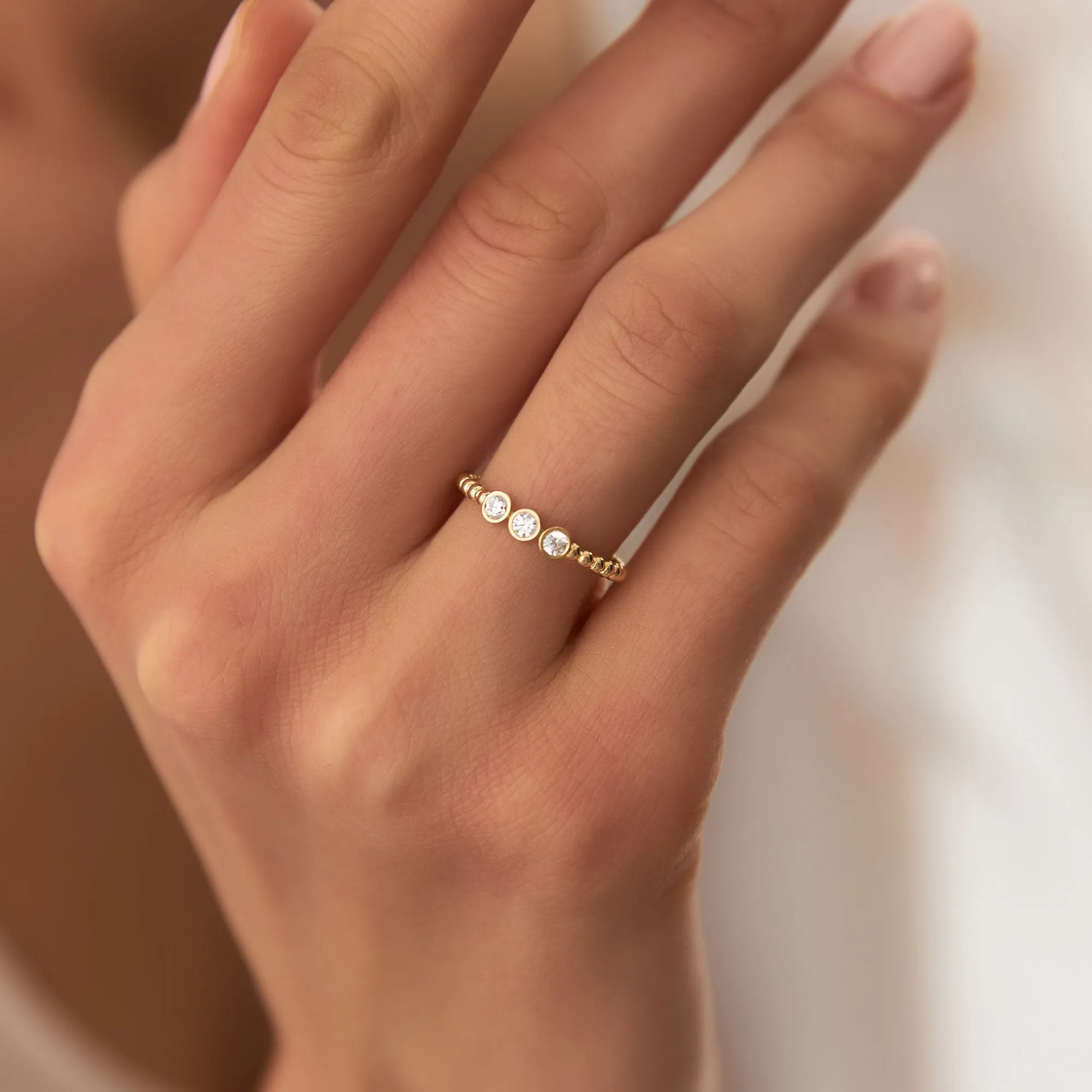 14k Beaded Three Stone Diamond Ring