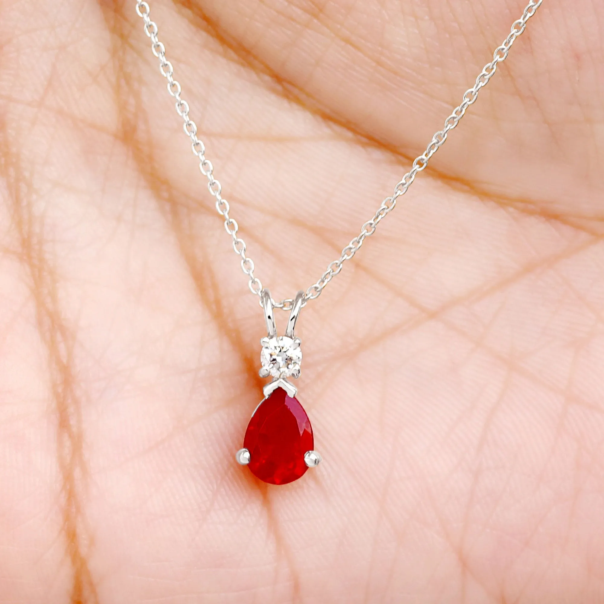 Pear Shape Lab Grown Ruby Solitaire Pendant with Moissanite