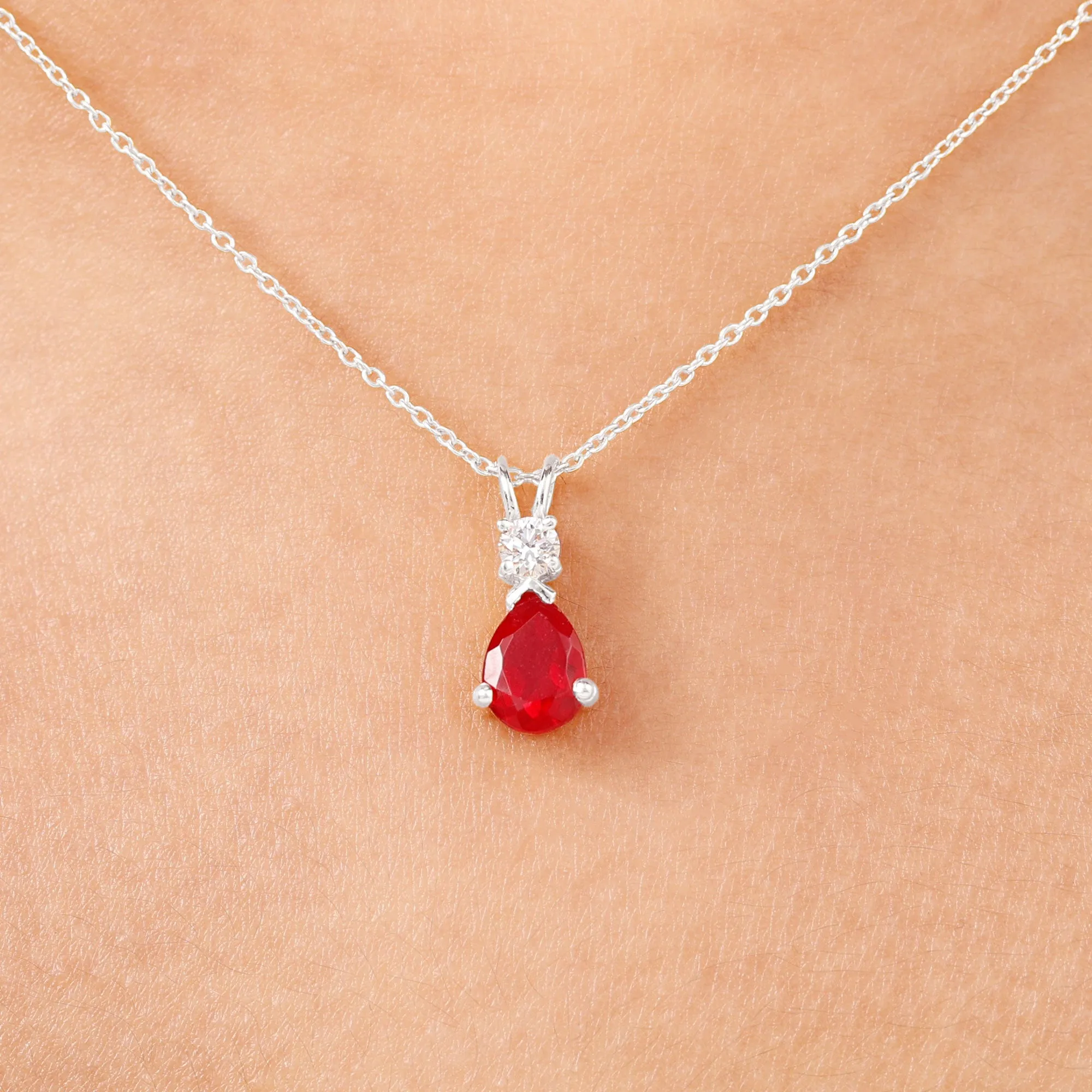Pear Shape Lab Grown Ruby Solitaire Pendant with Moissanite